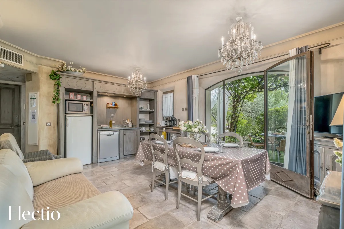 Bright living room of Loggia 1 Olivier at Résidence Les Petitons with fully equipped kitchen and direct access to the garden
