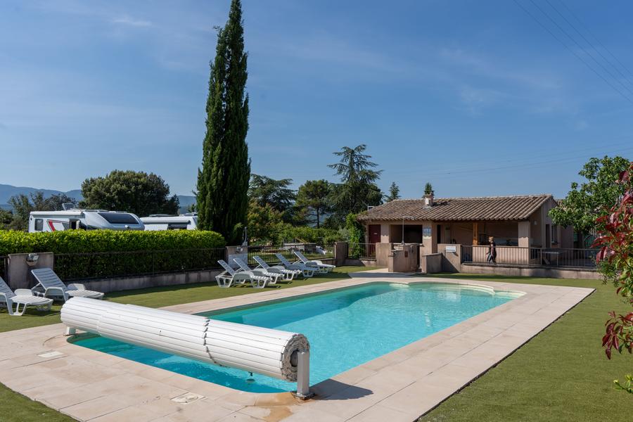 Swimming pool at Lubea Camping in Apt with sun loungers