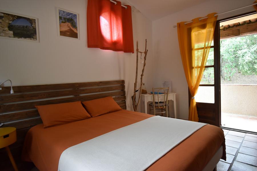 Durance Room with double bed and warm decor