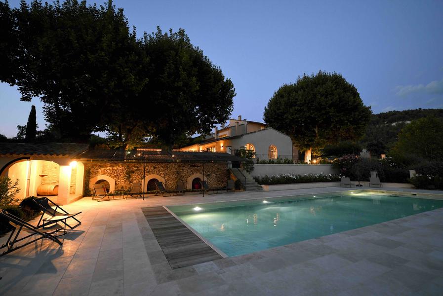 Pool and accommodation at Domaine Perréal Pool and accommodation at Domaine Perréal at sunset