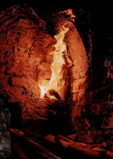 Medieval fireplace of the warming room at Sénanque Abbey, the only heated space used by the monks in winter