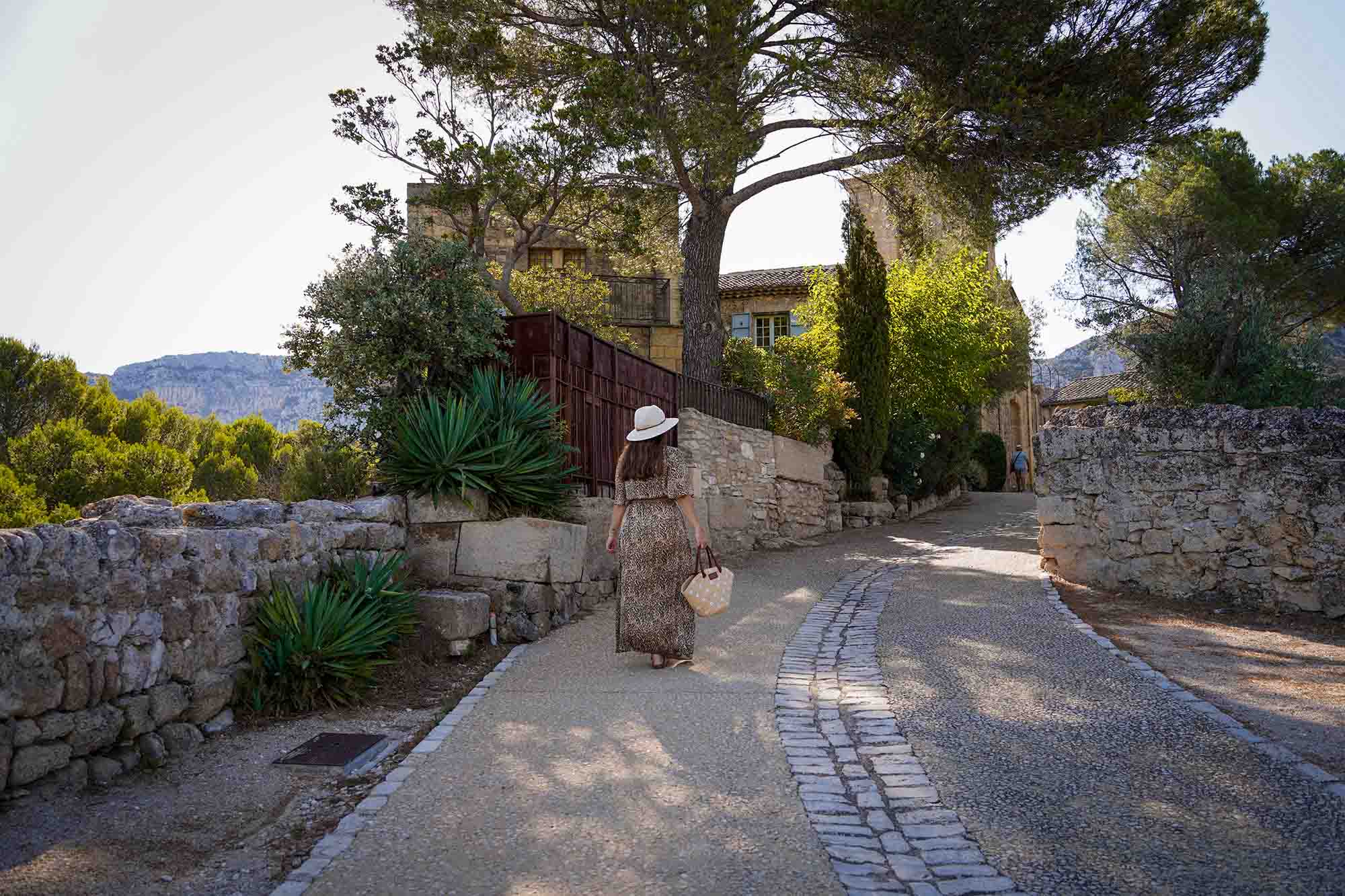 Street in the village of Les Taillades in the Luberon with stone walls and typical heritage