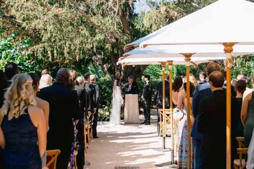 Outdoor wedding ceremony at Le Galinier in the garden