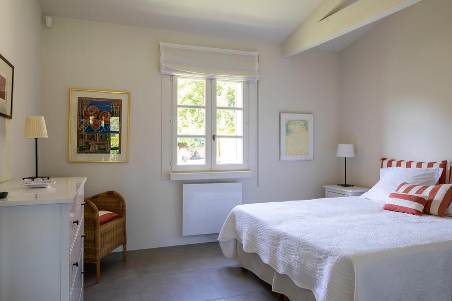 Comfortable bedroom in the annex of Mas Petit Collongue with double bed and garden view