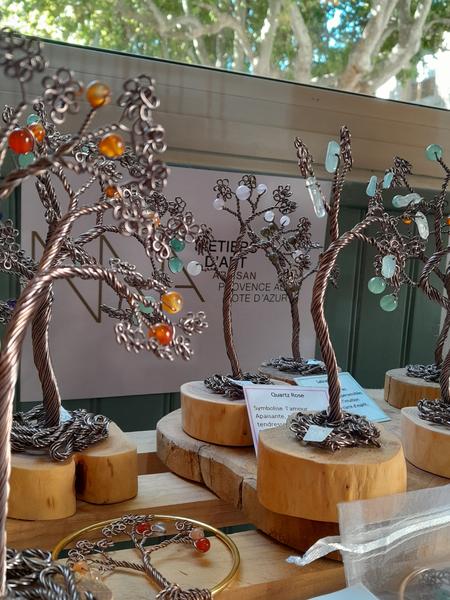 Handcrafted copper wire and bead creations displayed at WooDS Life Atelier