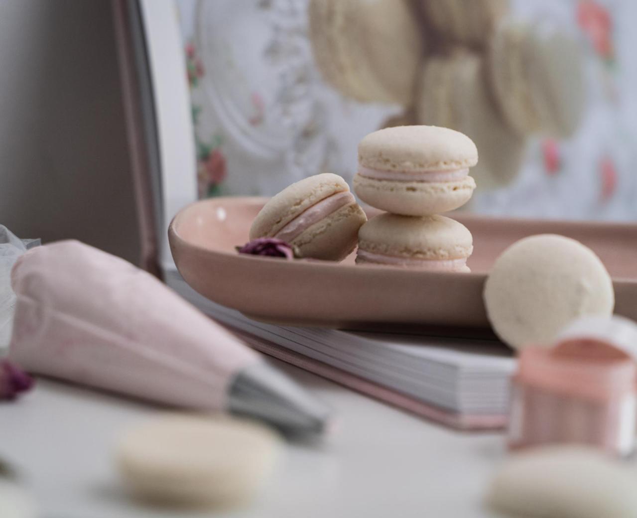 Artisanal macarons displayed during a sweet pastry workshop at Festival Confit!