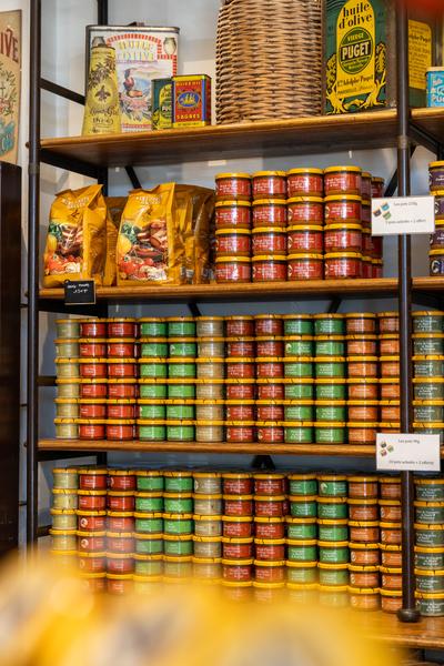 Shelves of Provençal specialities inside the Les Délices du Luberon shop