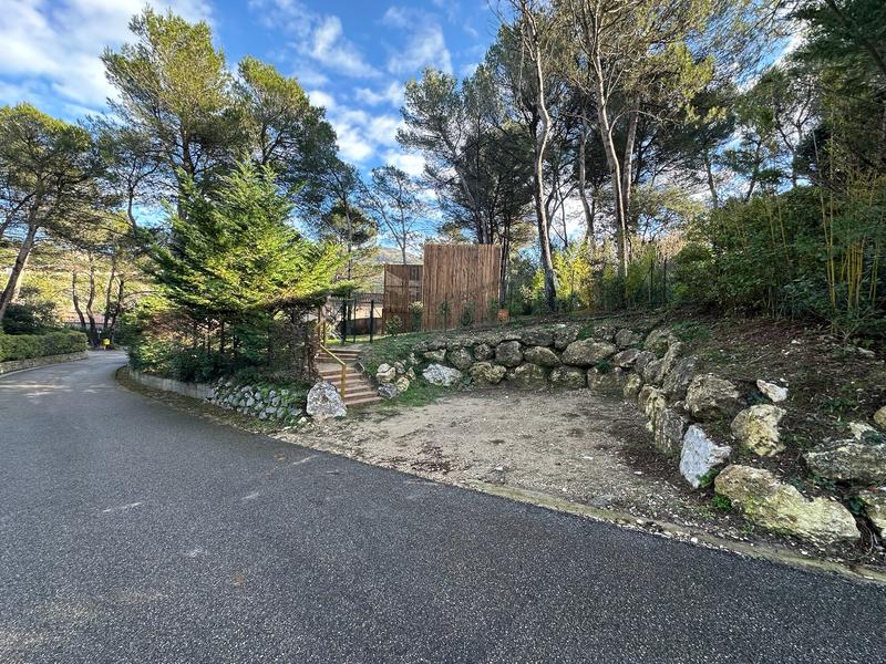 Wooden exterior of Bird in Provence with a covered terrace and outdoor steps