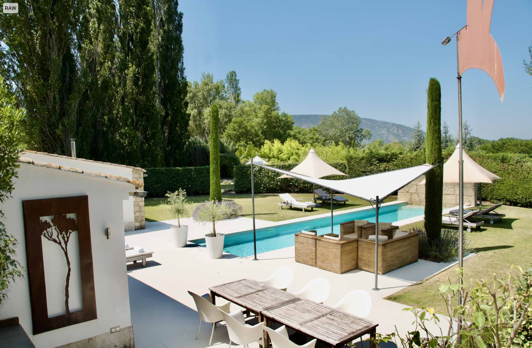 Lap pool, terraces and views over the Luberon at Les Cerisiers in Oppède Lap pool and terraces at Les Cerisiers with views over the Luberon hills