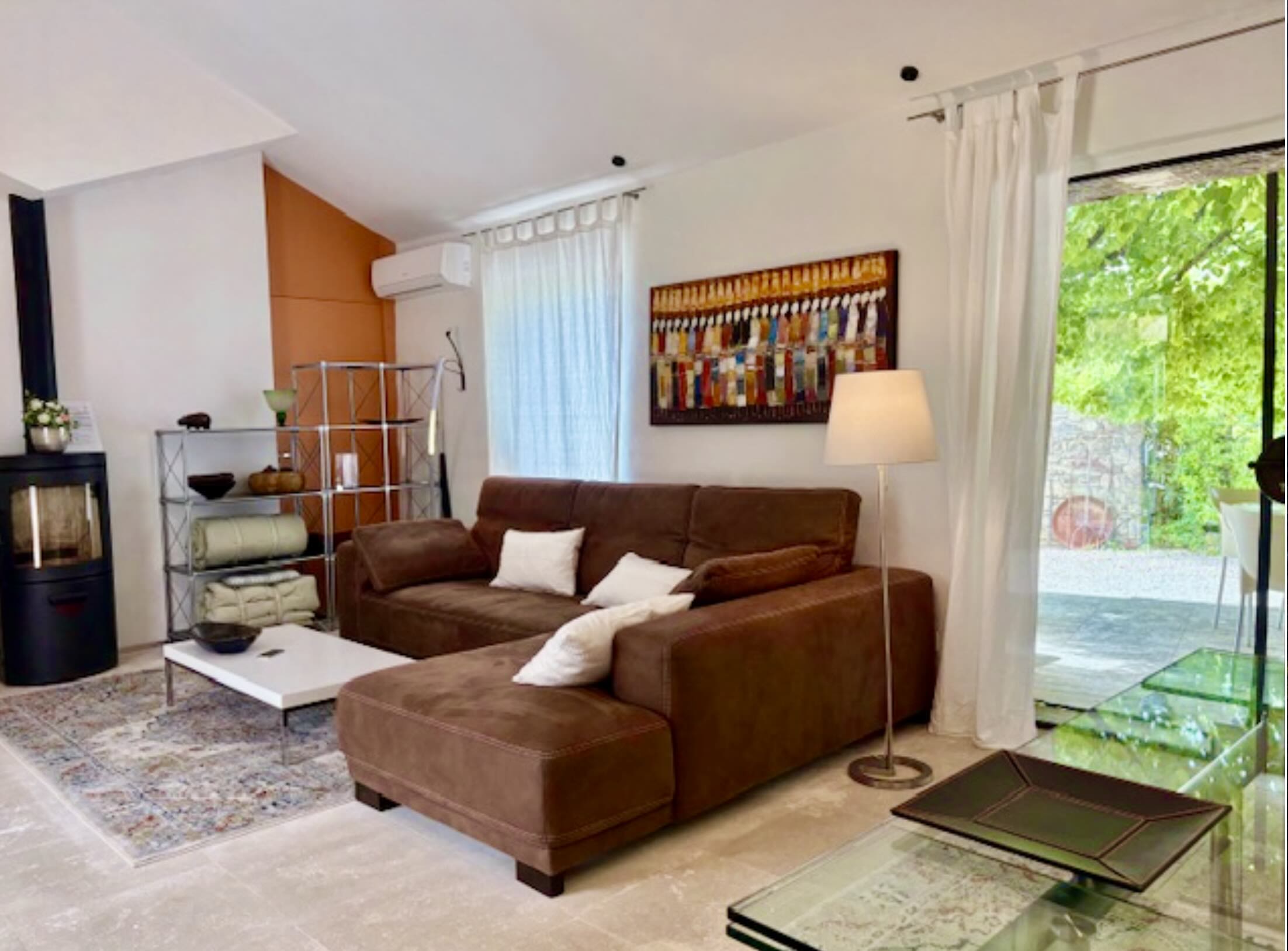Bright living room with views over the Luberon hills at Les Cerisiers Spacious living room at Les Cerisiers, Maison Bertuli, with views over the Luberon