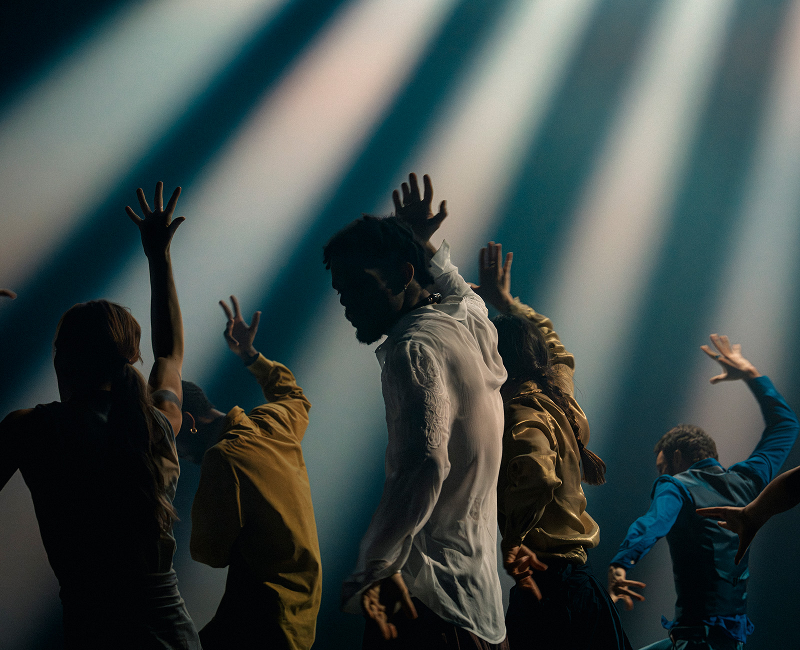 Scene from the show In the Brain with dancers in movement