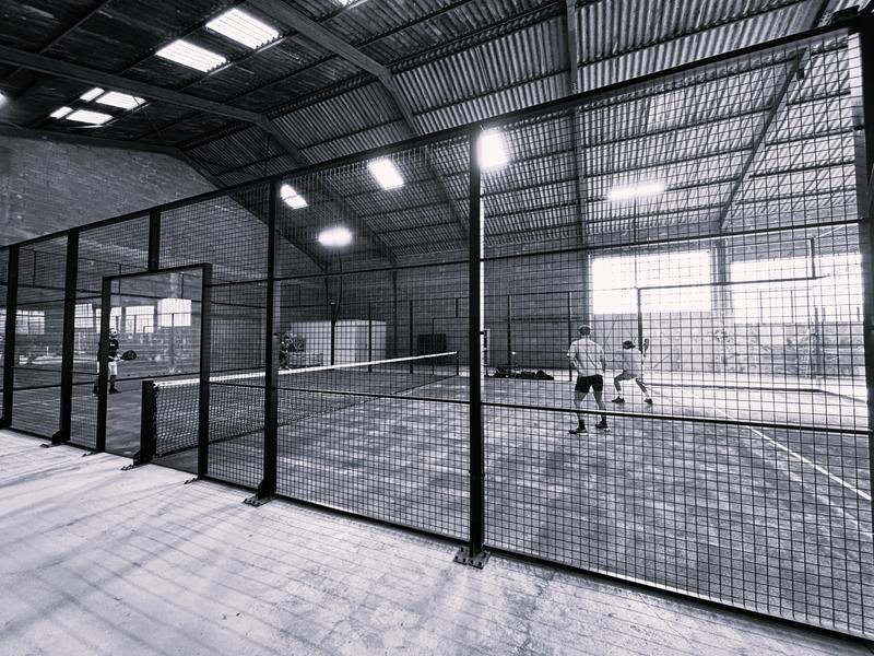 Private covered padel court at Maison Poumo