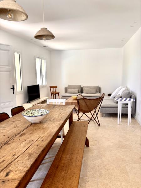 Dining and living area at Maison Poumo