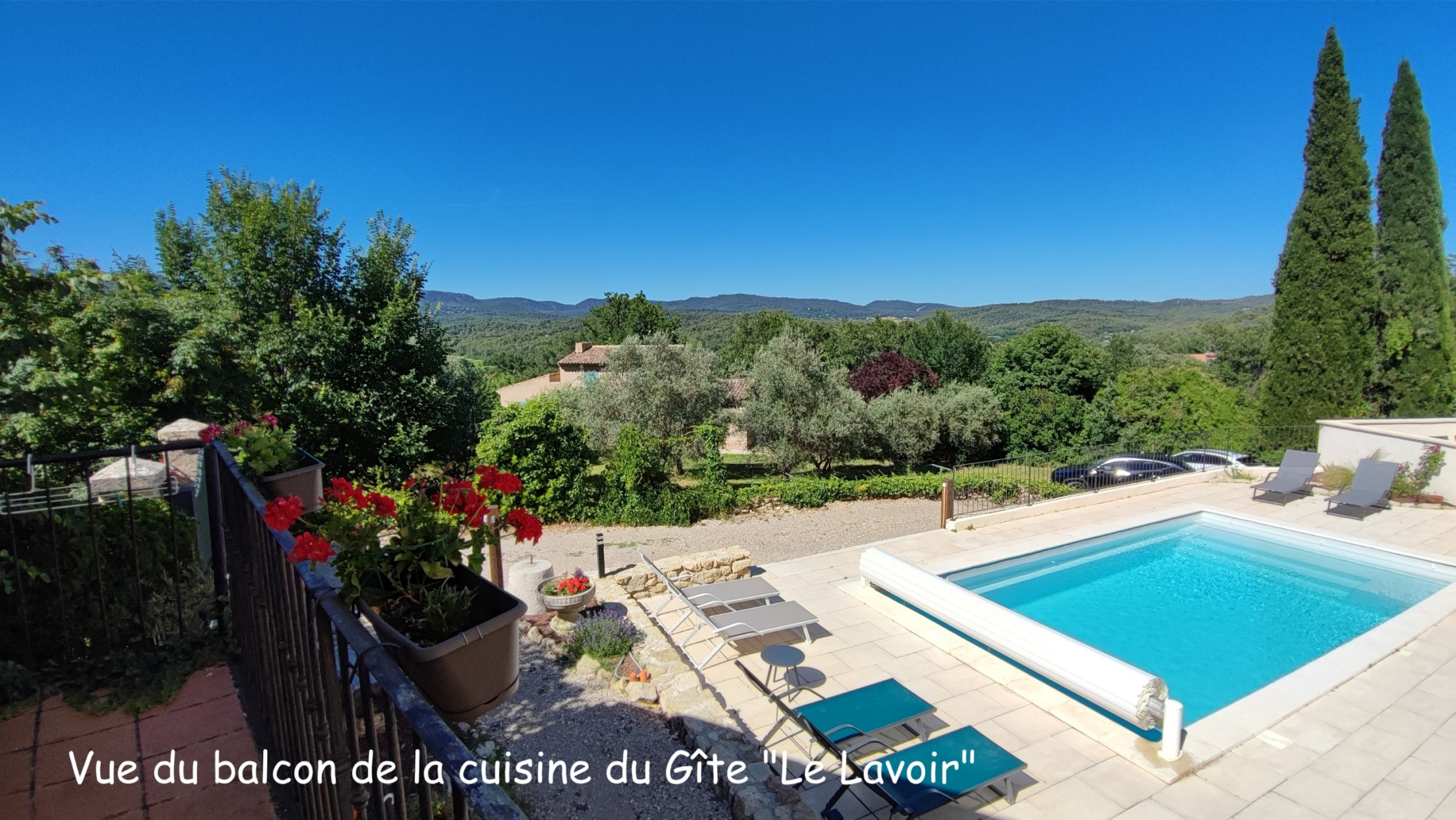 View of the swimming pool and Luberon countryside from the balcony at Le Lavoir