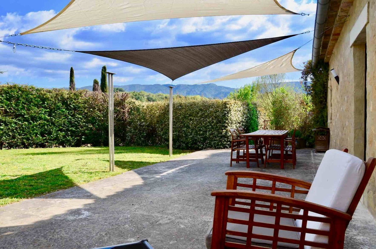 Private terrace at Les Cerisiers with garden and open views over the Luberon