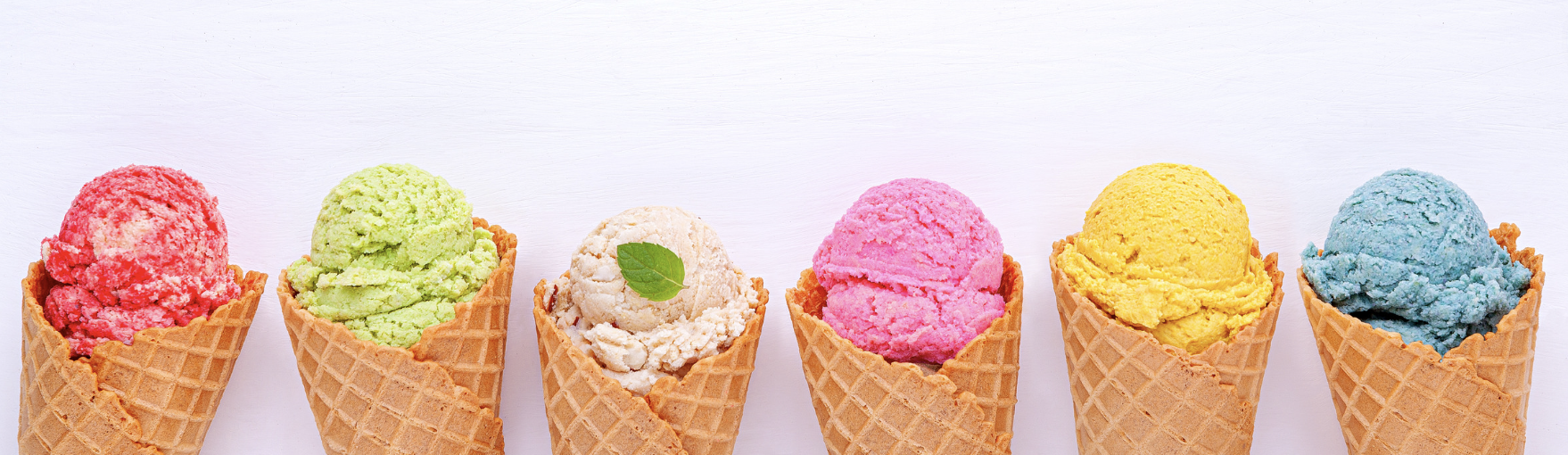 Colourful cones of artisan ice cream illustrating a selection of ice cream parlours in the Luberon