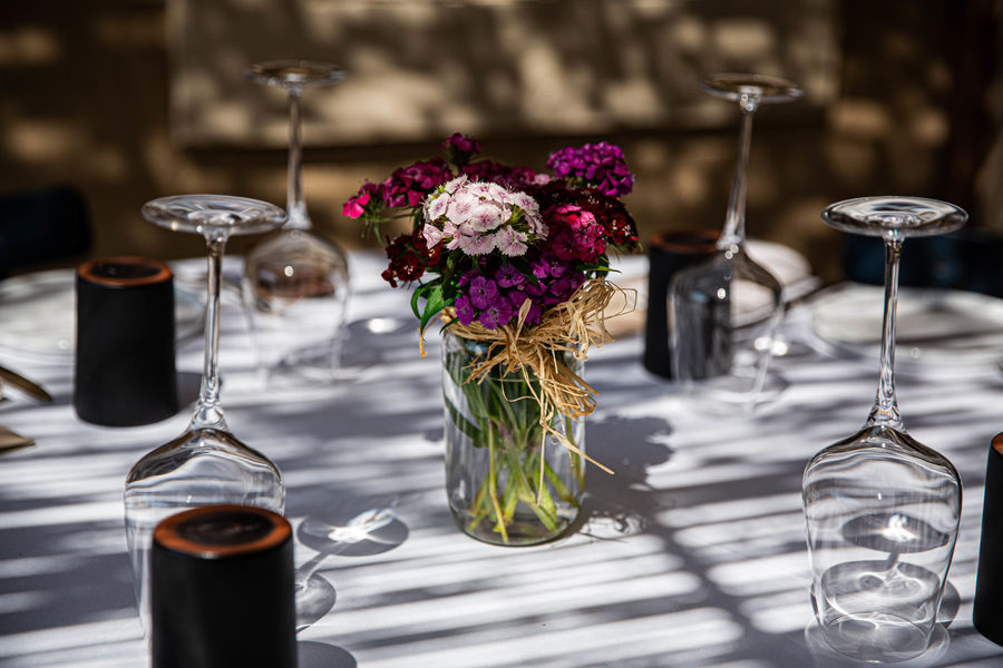 Elegantly set table at Le Goût du Bonheur, Nadia Sammut’s Michelin-starred restaurant at La Fenière