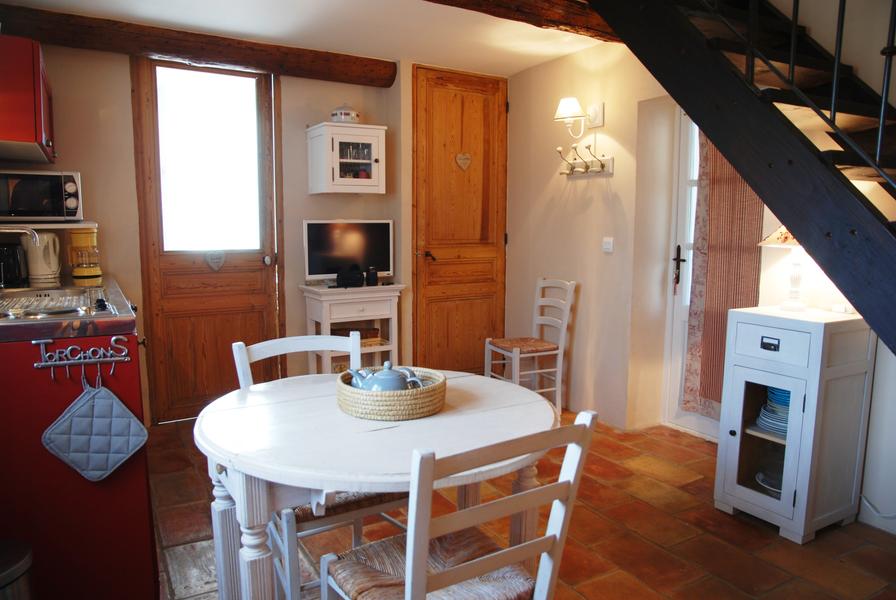 Kitchen of Le Cocon holiday rental at La Maison Magnarelles Kitchen and dining area of Le Cocon holiday rental at La Maison Magnarelles