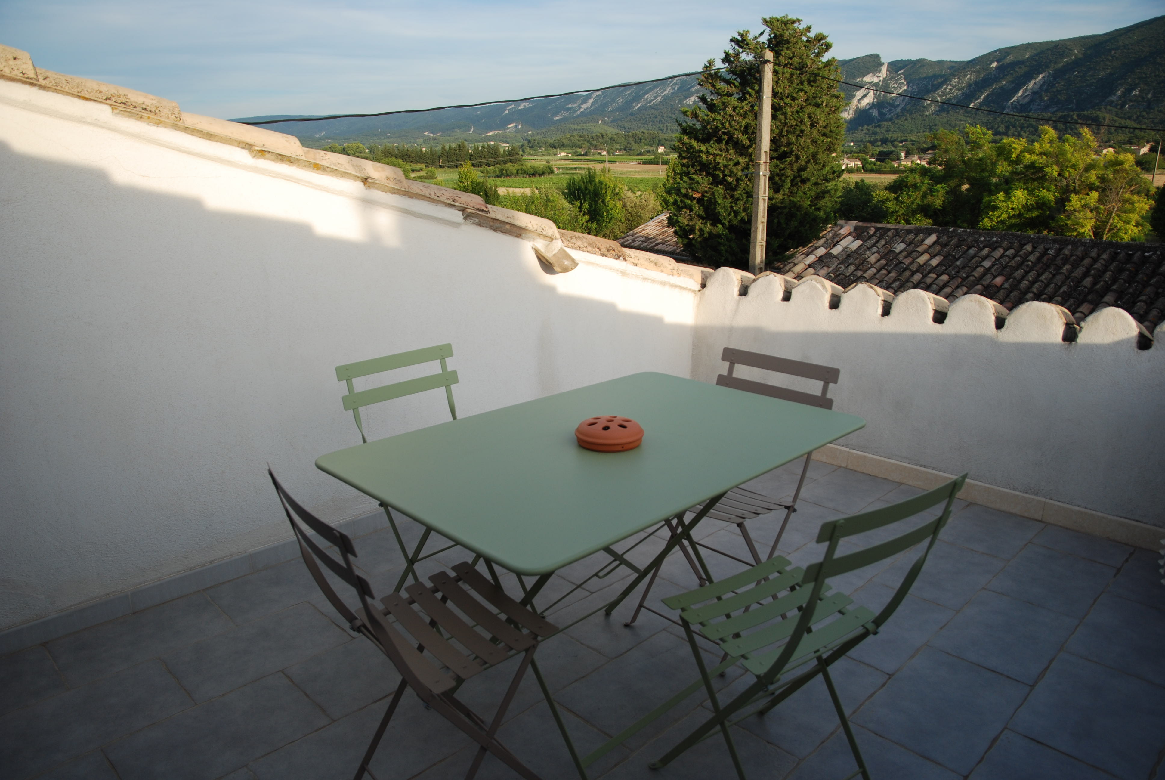 Terrace of Les Magnans holiday rental with view of the Luberon Private terrace of Les Magnans holiday rental overlooking the Luberon