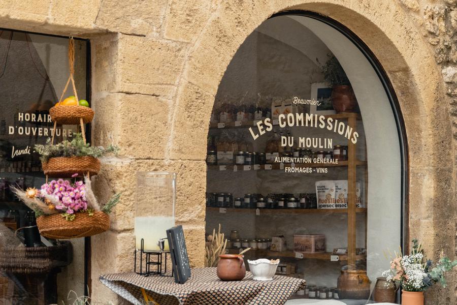 Facade of Les Commissions du Moulin, café and delicatessen in Lourmarin