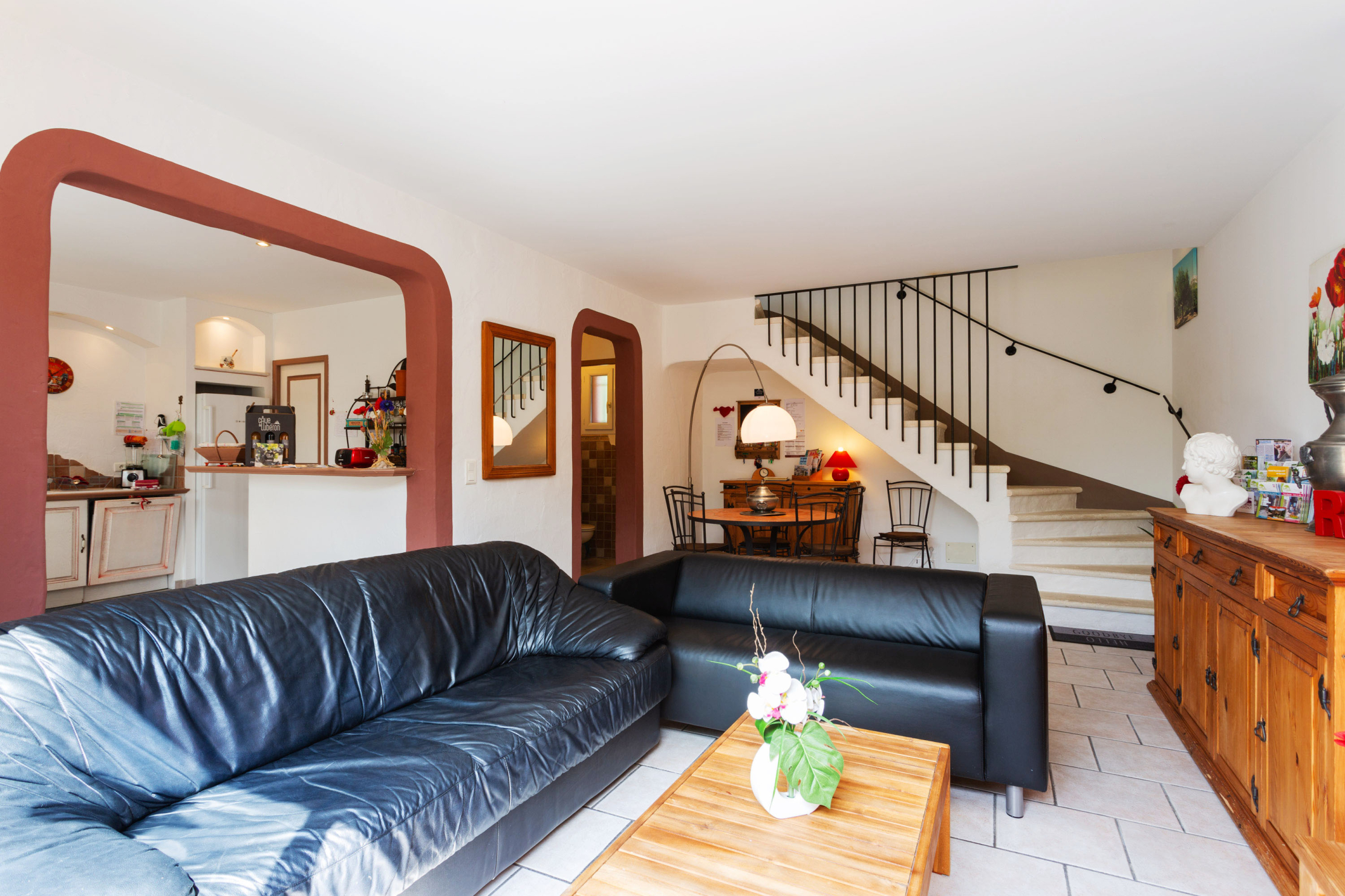 Bright living room in 6-person holiday villa with open kitchen in Provence